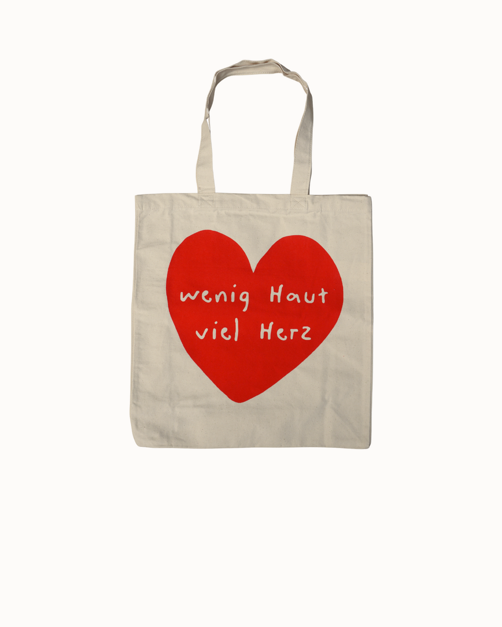 Nachhaltige Jutetasche mit rotem Herz und Spruch "Wenig Haut, viel Herz" - ideal fürs Bouldern.